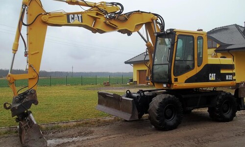 Аренда колесного экскаватора Caterpillar M312 VA