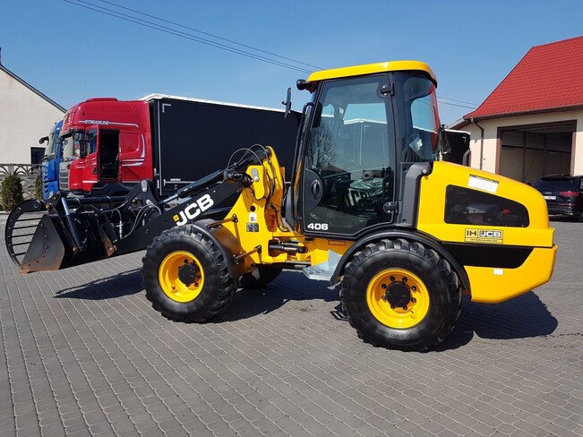 Аренда фронтального погрузчика (колесного) JCB 406